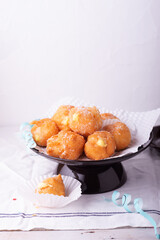 Brighelle, very soft fried sweets typical of Carnival and filled with various creams.