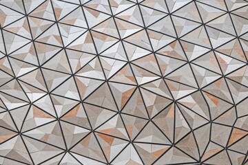 Geometric pattern of stone tiles arranged in triangles