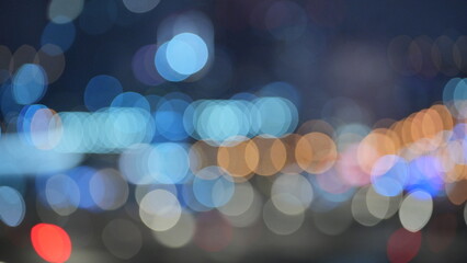Fototapeta premium blurred background of night lights in the city