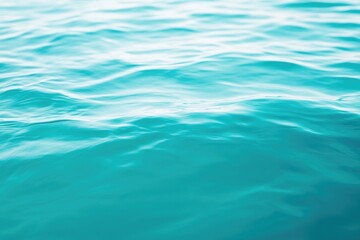 Clear water surface with subtle ripples and reflections