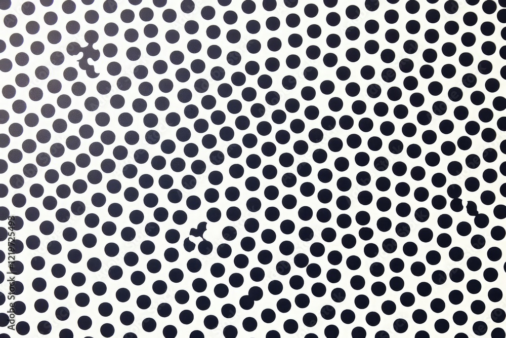 Poster a white surface with a pattern of black circles arranged in a diagonal grid