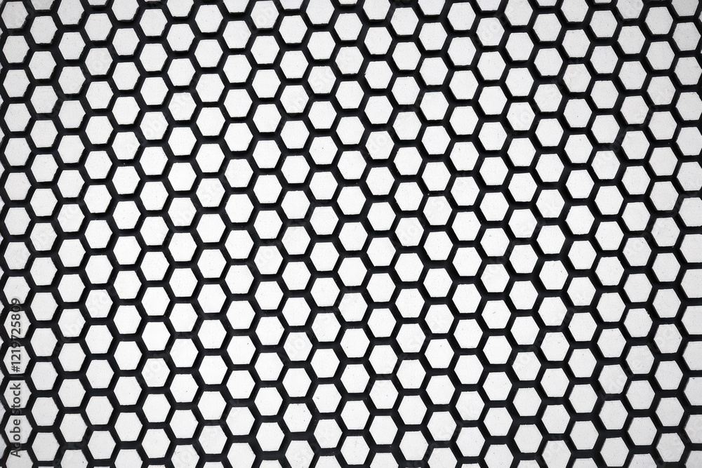 Poster a black and white image of a repeating hexagonal pattern
