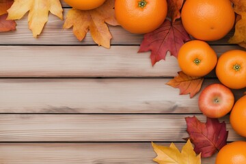Autumnal fruits, colorful leaves arranged on rustic wooden planks. Oranges, apples sit amongst vibrant fall foliage. Warm colors, natural textures create inviting atmosphere. Perfect for autumnal