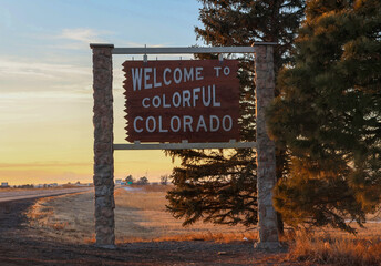 Welcome to Colorful Colorado road sign along interstate highway on the eastern Colorado border at...