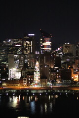 Naklejka premium Birds eye view of the city skyline of downtown Pittsburgh, Pennsylvania at night.