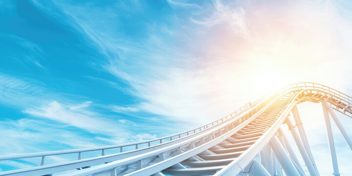 Empty roller coaster attraction against the sky background. Train ride in amusement park, nobody.