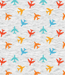 Seamless vector pattern of colorful airplanes on gray background for children’s textile design
