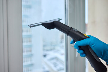 Winter Window Cleaning performed with a Squeegee for optimal results and clarity
