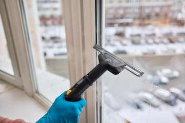 Winter Window Cleaning performed with a Squeegee for optimal results and clarity