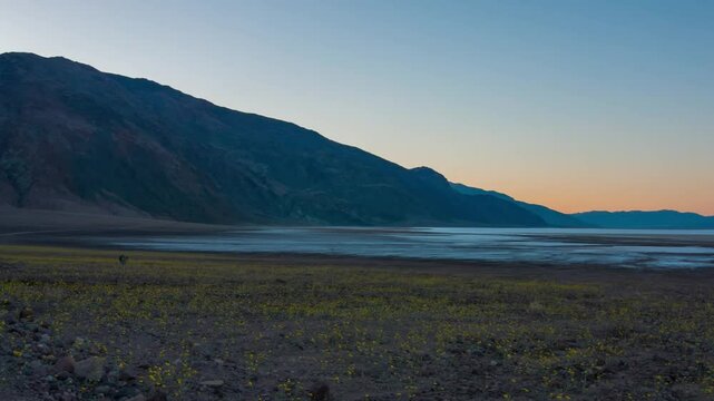 Lake Manly, a pluvial lake, occasionally forms in Badwater Basin, Death Valley National Park, after heavy rainfall. Once vast during the 'Blackwelder stand'