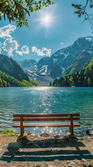 Serene Landscape: Inviting Turquoise Lake Nestled Amidst Snow-Capped Mountains and Lush Greenery