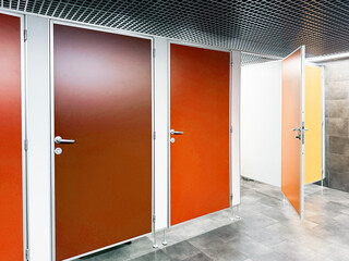 Public toilets, cabins, colorful doors, wc