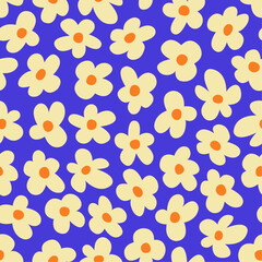 Seamless vector pattern with daisies on blue background. Floral ornament