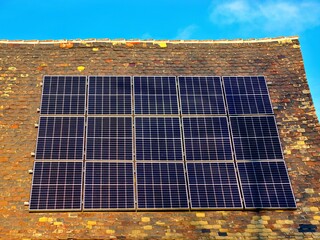 solar panels on a roof, alternative green energy
