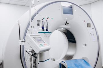 Contrast agent and CT scanner before diagnostics in the room. The concept of using modern...