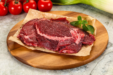 Raw beef cheeks cut for cooking