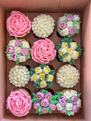 Decorative Flower Cupcakes Arranged in Boxes
