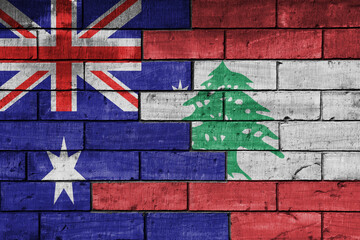 colourful painted big flag of australia and flag of lebanon on a massive old brick wall background. concept