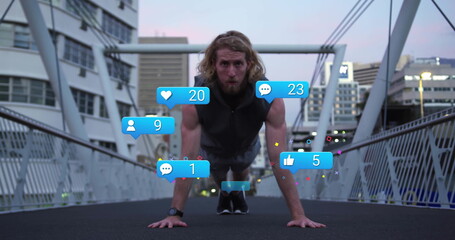 Doing push-ups on bridge, man with social media notifications image over