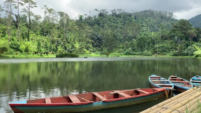 Hidden in the pine forests of Gununglurah, Telaga Kumpe is a serene mountain lake nestled on Mount Slamet's slopes. 