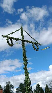 Midsummer pole on the sky background , Swedish tradition