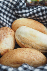 Freshly Baked Artisan Bread Rolls Presented in a Decorative Basket