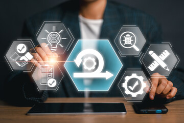 Businessman engaging with digital interface representing agile development, showcasing innovation and technology in modern business practices.