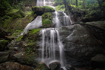 Fototapeta premium Natural waterfall in the interior of the South Kalimantan forest, so cool and still pristine