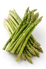 Bunch of fresh green asparagus stems isolated on white, top view
