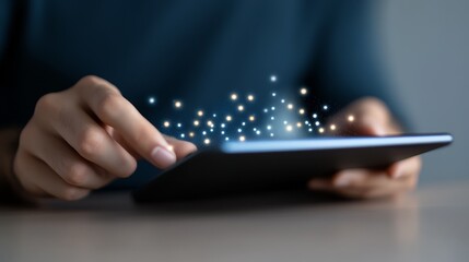 Illuminating innovation, a person engages with glowing star interface on tablet