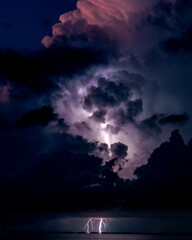 Lightning through clouds