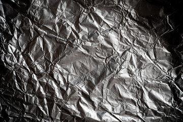 鈍い光を放つ金属背景