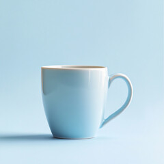 Obraz premium A pastel blue ceramic mug placed on a soft blue background, branding, design place concept