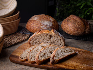 Sliced Artisan Sourdough Bread on Wooden Table.