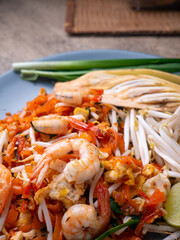 Pad Thai is a stir fry rice noodles with shrimp. Popular Thai street food.