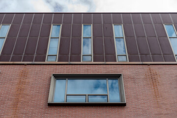 Architectural elements like walls and fences with diverse designs defining exterior and interior spaces.