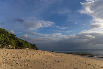 The beach in Koh Lanta Island at dusk with clouds, Thailand