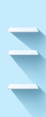 Three empty white shelves against a light blue wall.