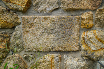 Architectural elements like walls and fences with diverse designs defining exterior and interior spaces.