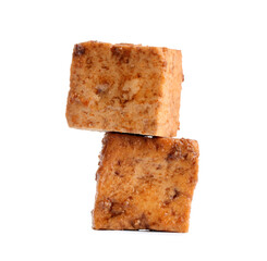 Pieces of fried tofu cheese on white background