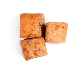 Pieces of fried tofu cheese on white background