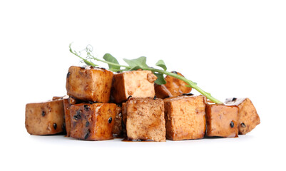 Pieces of fried tofu cheese with soy sauce and micro green on white background