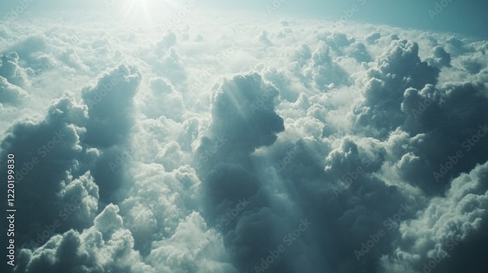 Poster dramatic view of clouds from above with visible sunlight shining through, creating a peaceful scene