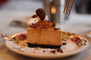 Plated slice of chocolate cheesecake at an upscale restaurant in downtown Minneapolis, Minnesota.