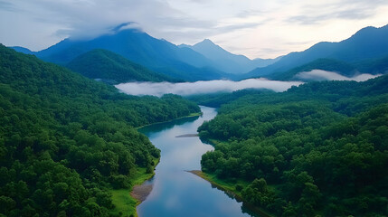 Serene mountain river valley dawn mist landscape; nature travel postcard