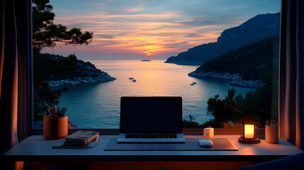 Fototapeta premium Sunset coastal view from home office window; laptop, books, candle. Work-life balance, remote work image