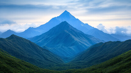 Majestic mountain peaks during sunrise remote wilderness landscape serene environment aerial view