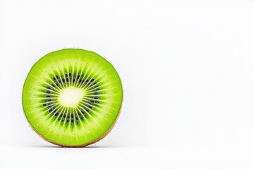 Freshly sliced kiwi fruit showcasing vibrant green flesh and black seeds against a clean white background
