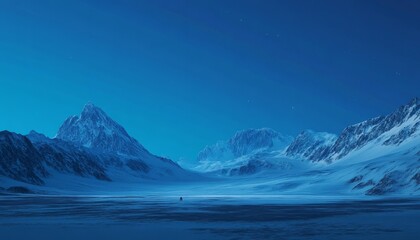 Solitary figure on frozen lake, snow-covered mountains under twilight sky.