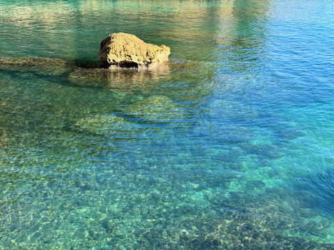 Mediterranean sea with crystal clear turquoise blue water.